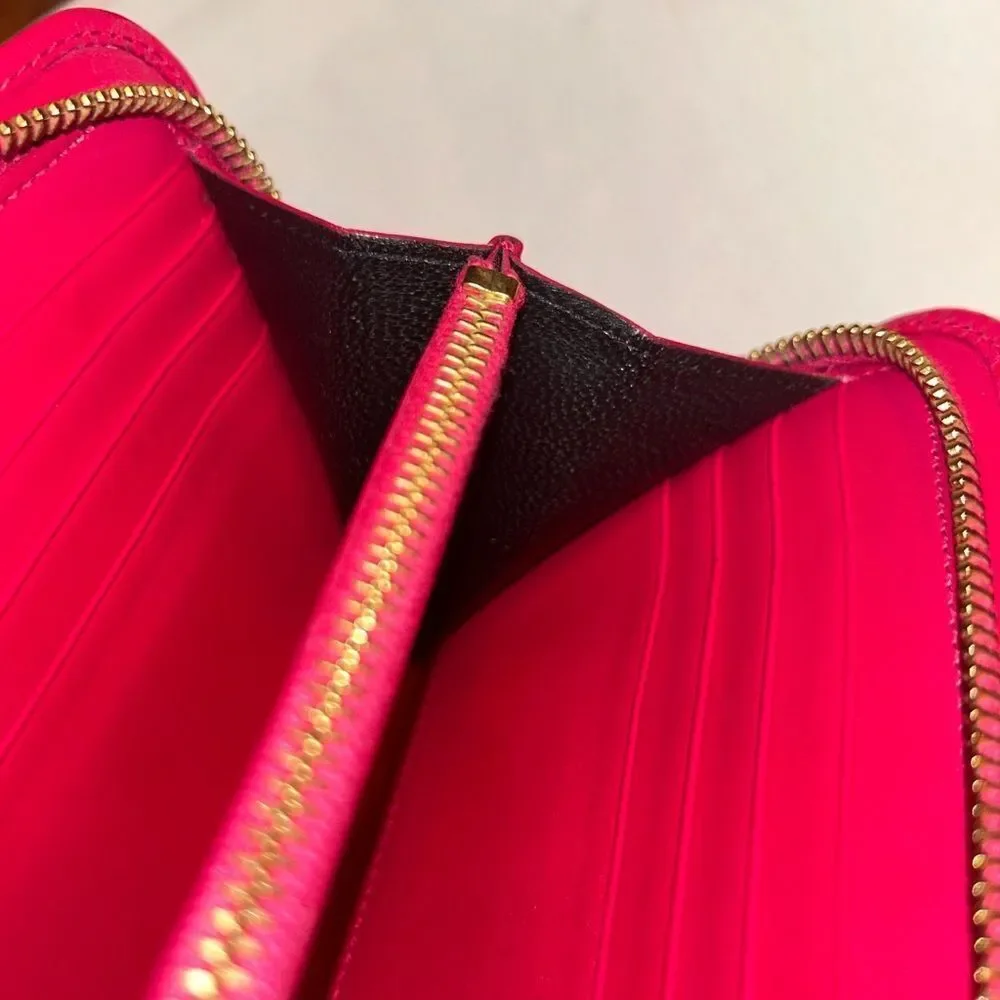 Authentic Saint Laurent Pink Zippy Wallet